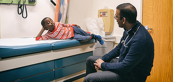 pediatric patient talking with a doctor