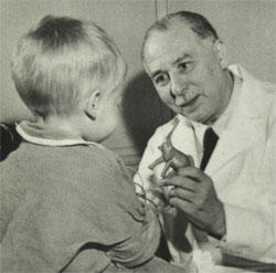 Dr. Sidney Farber with a young patient.