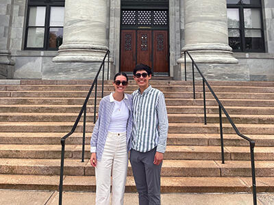 Two fellows in front of Harvard Medical School
